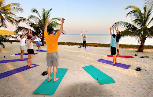 Sunrise yoga at Glovers Reef