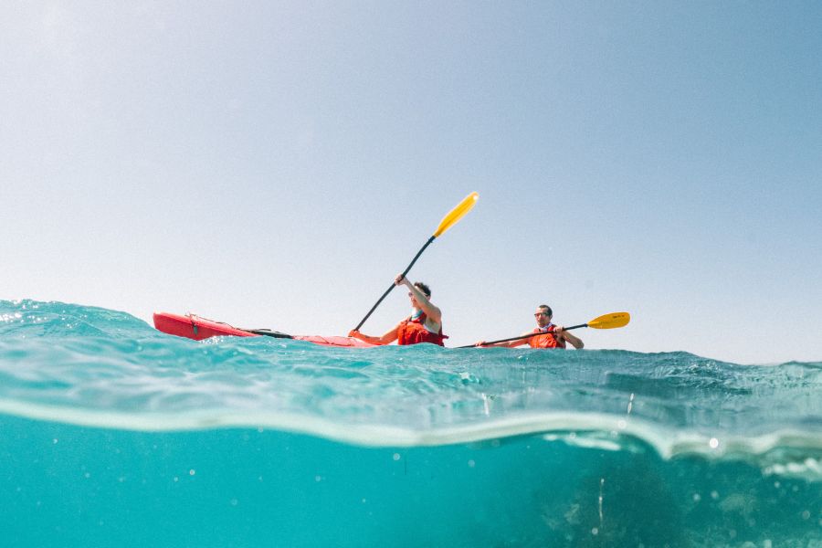 Couple kayaking on the Belize barrier reef
