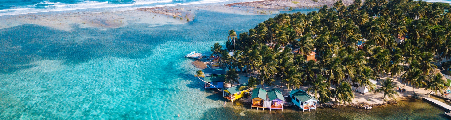 aerial view of tobaco caye paradise in belize