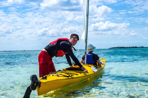 Kayak sailing on Glover’s Reef, Belize