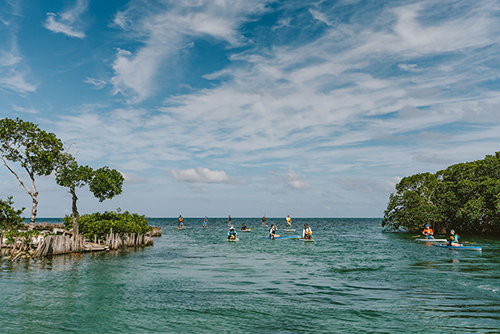 Paddling on Tobacco Caye Belize