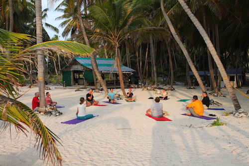 Sunrise yoga at Lighthouse Reef