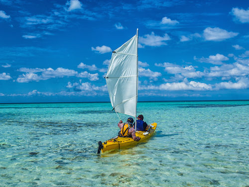 Kayak sailing on Glover’s Reef, Belize