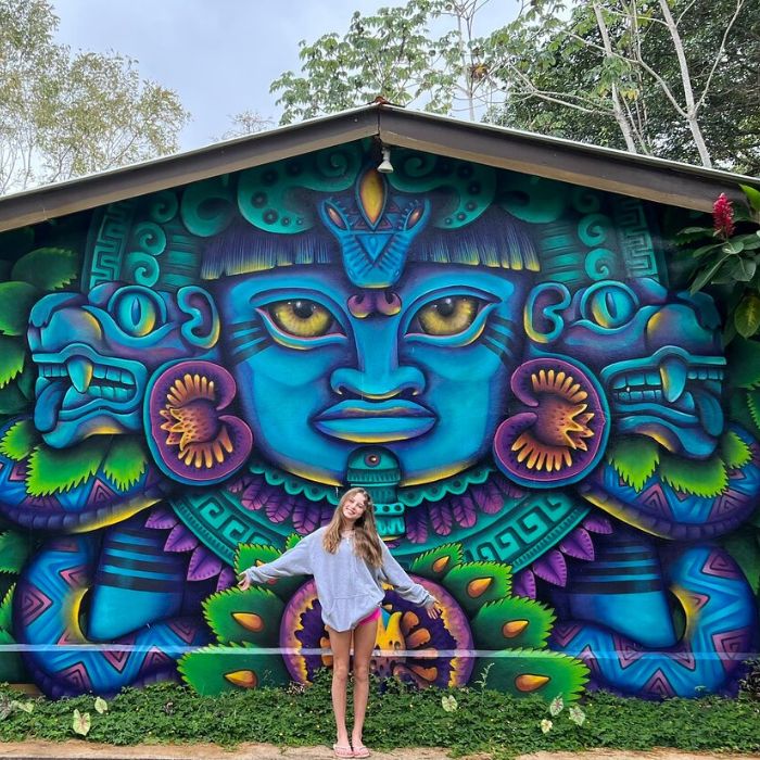 Girl visiting Mayan Mural