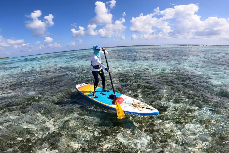 paddle board group in Belize