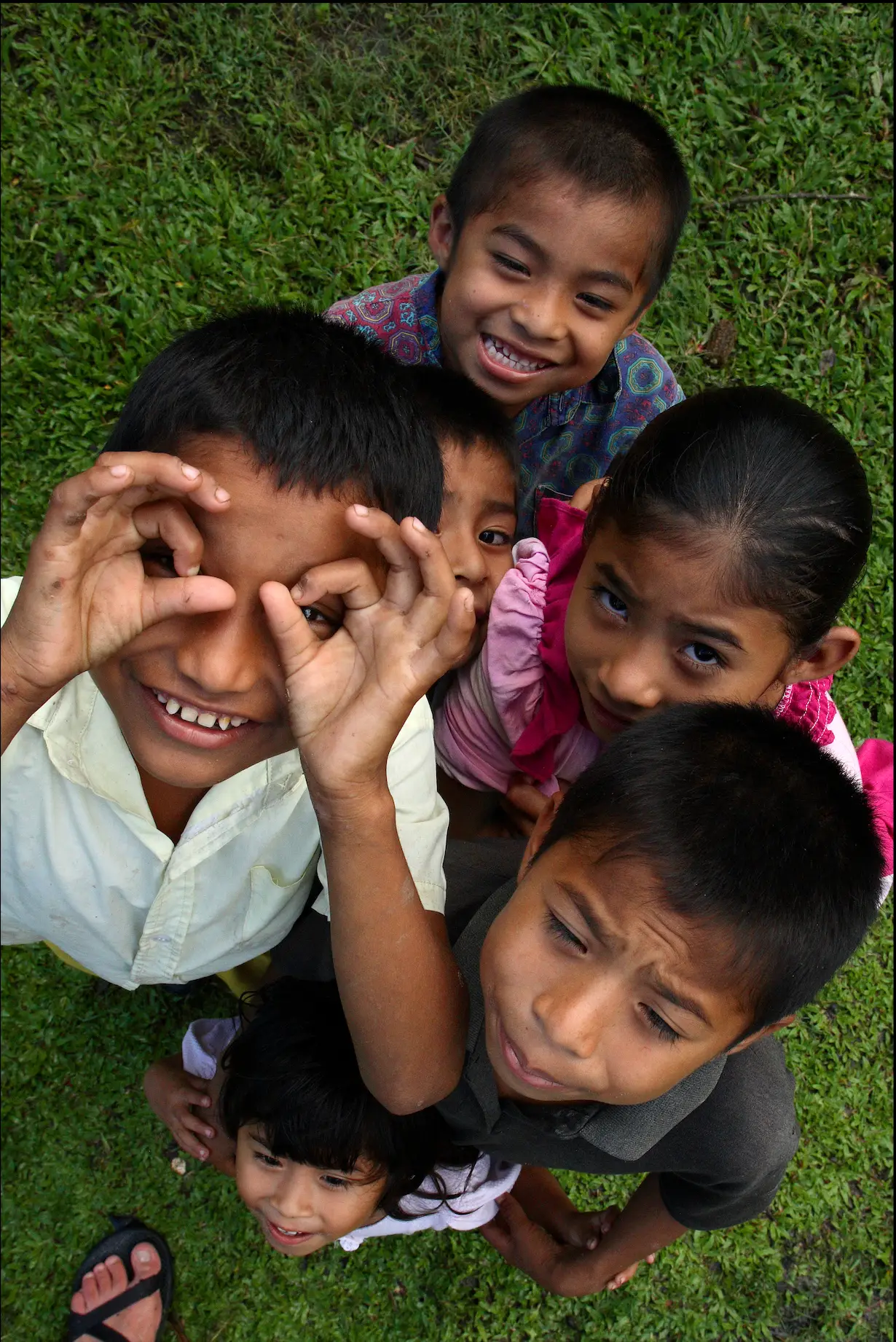 Local School children pose for the camera in Santa Teresa, Belize