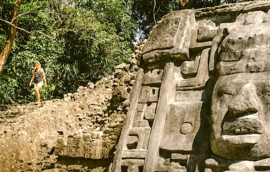 temple masks at the archeological site of Lamanai in Belize